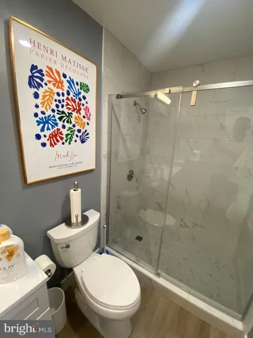 a view of a painting on the wall in a bathroom