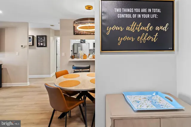 a view of a tables and chairs in a kitchen