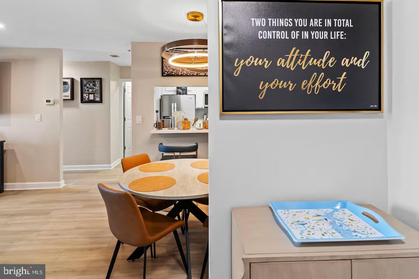 100 Harborview Drive, Unit 507 Baltimore, MD 21230 - Photo 7 of 28 a view of a tables and chairs in a kitchen