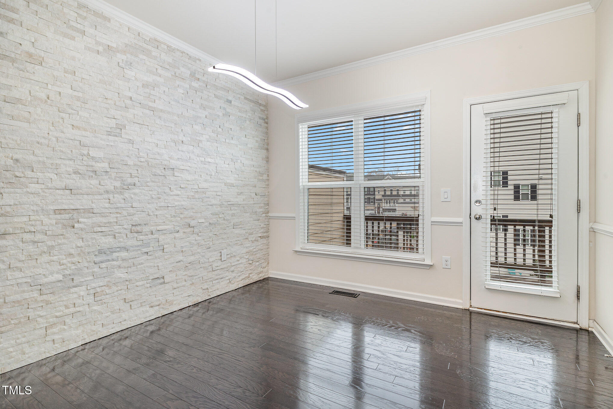 7002 Reedybrook Crossing Apex, NC 27523 - Photo 5 of 27 Dining Room with Feature Wall