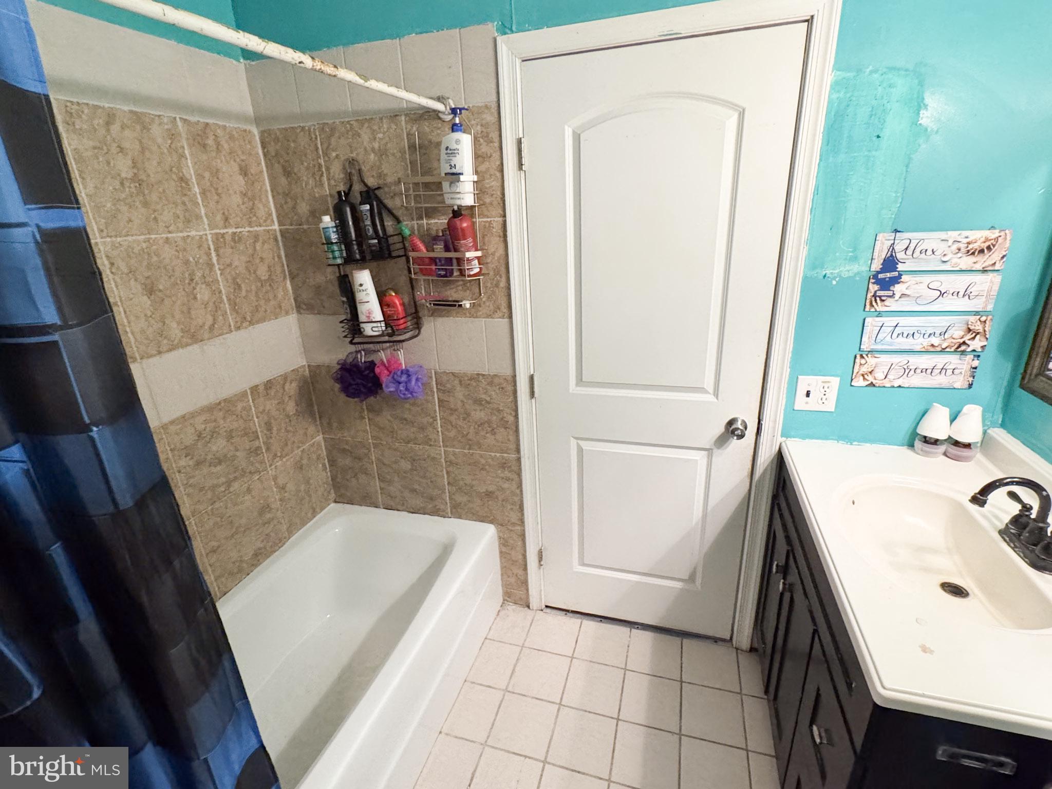 4512 Woodpecker Road Seaford, DE 19973 - Photo 21 of 32 Charming bathroom with vibrant accents.