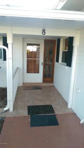 a living room with a rug