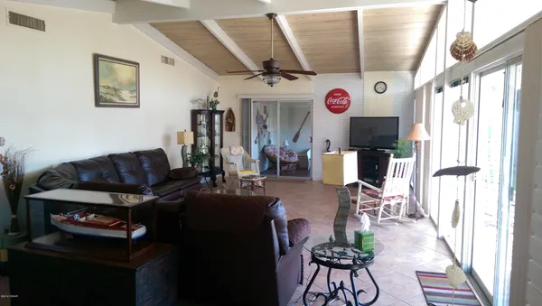 a room with a table and chairs