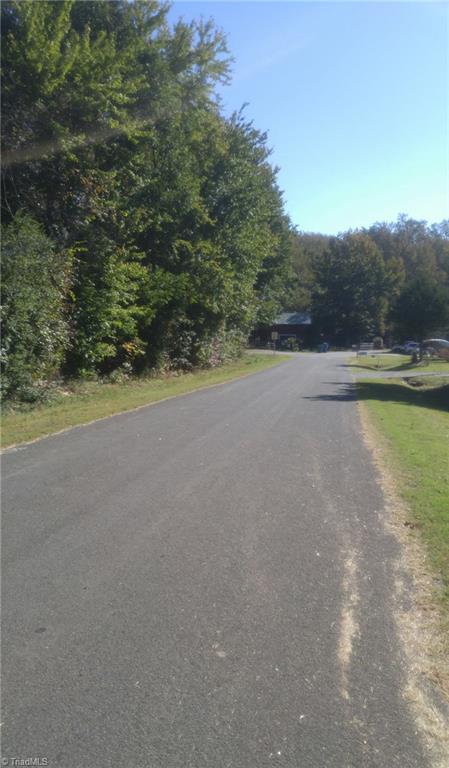 0 Busick Road Reidsville, NC 27320 - Photo 1 of 2 This is the view from the road. Lot is on the left before you get to the end of the street.