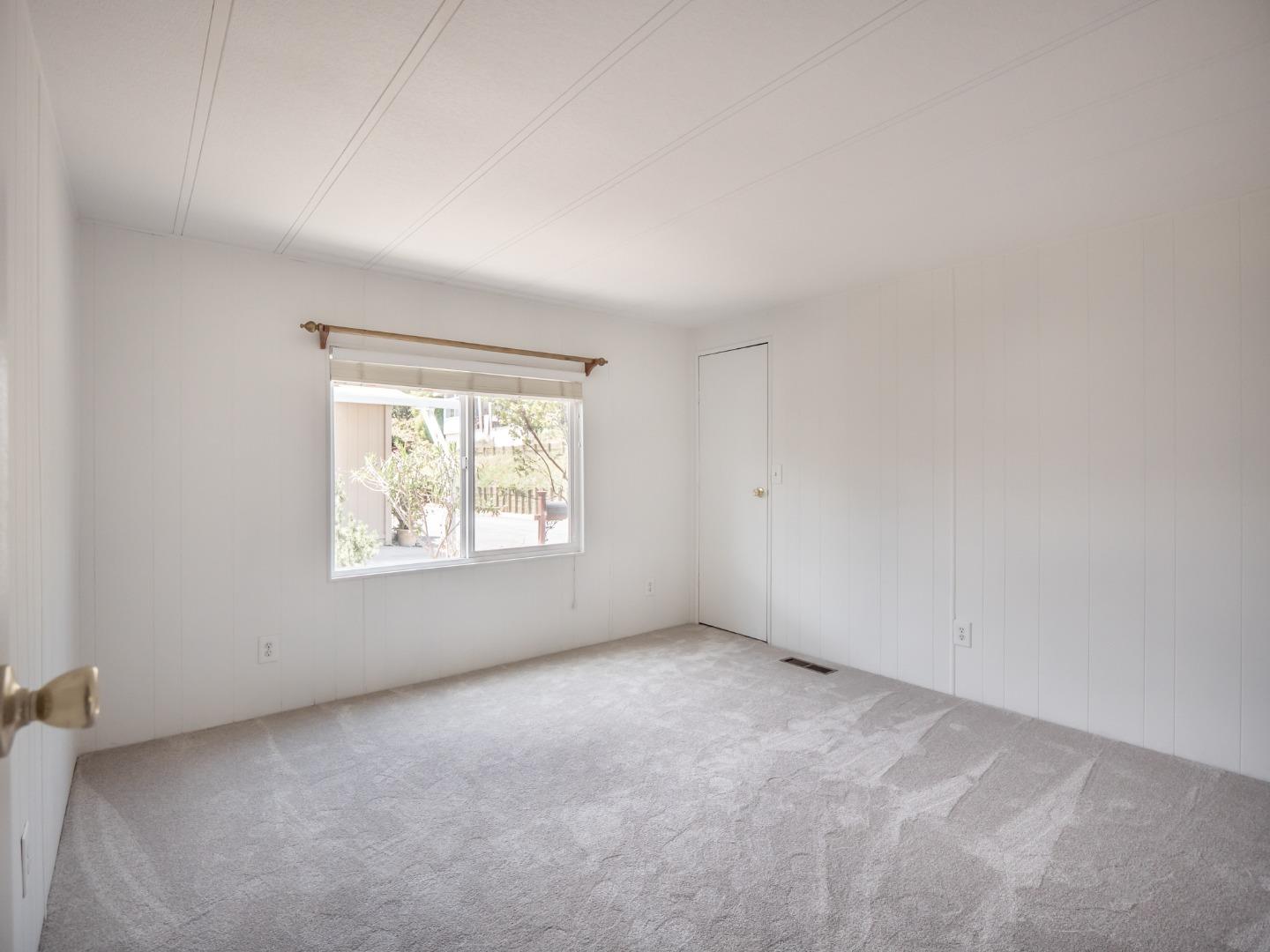 270 Hames Road, Unit 60 Corralitos, CA 95076 - Photo 17 of 32 an empty room with a window