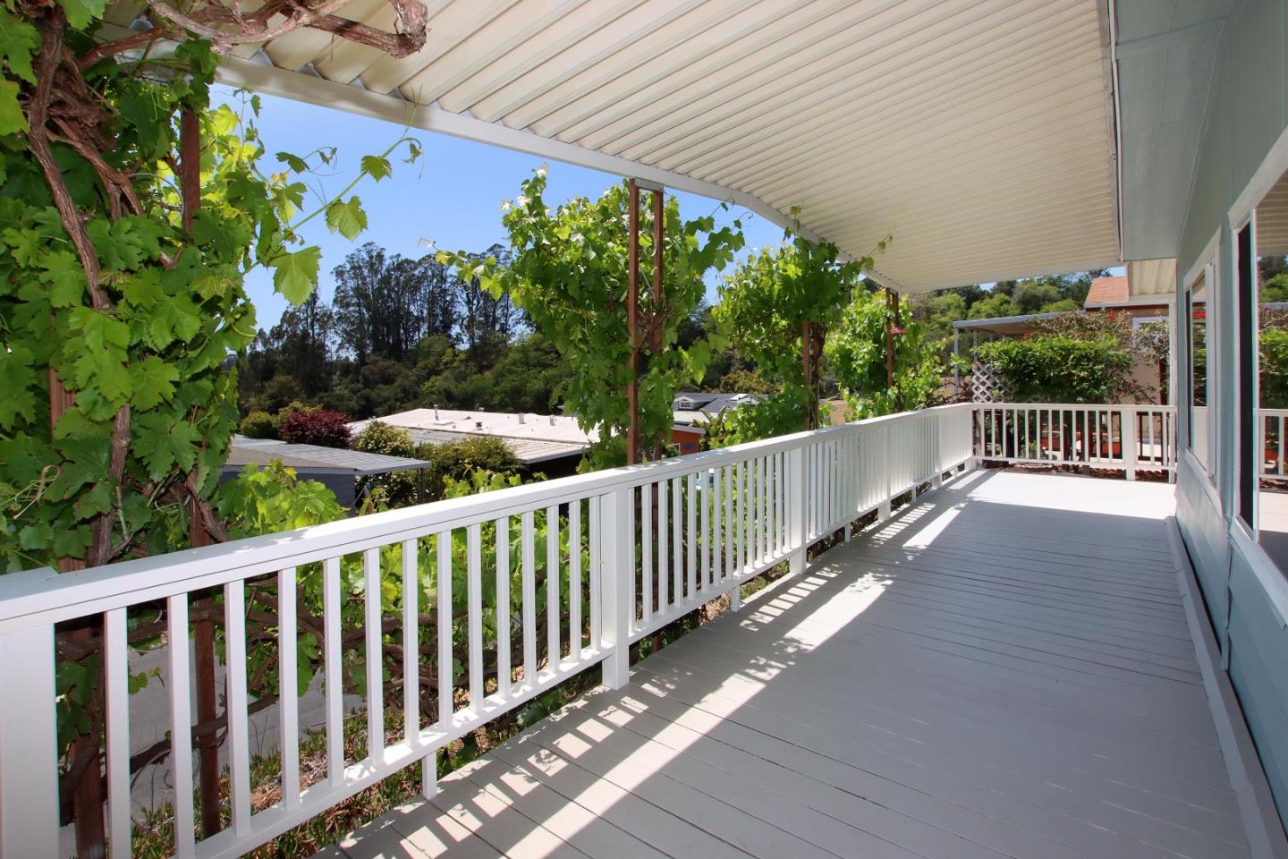 270 Hames Road, Unit 60 Corralitos, CA 95076 - Photo 2 of 32 a view of a wooden fence
