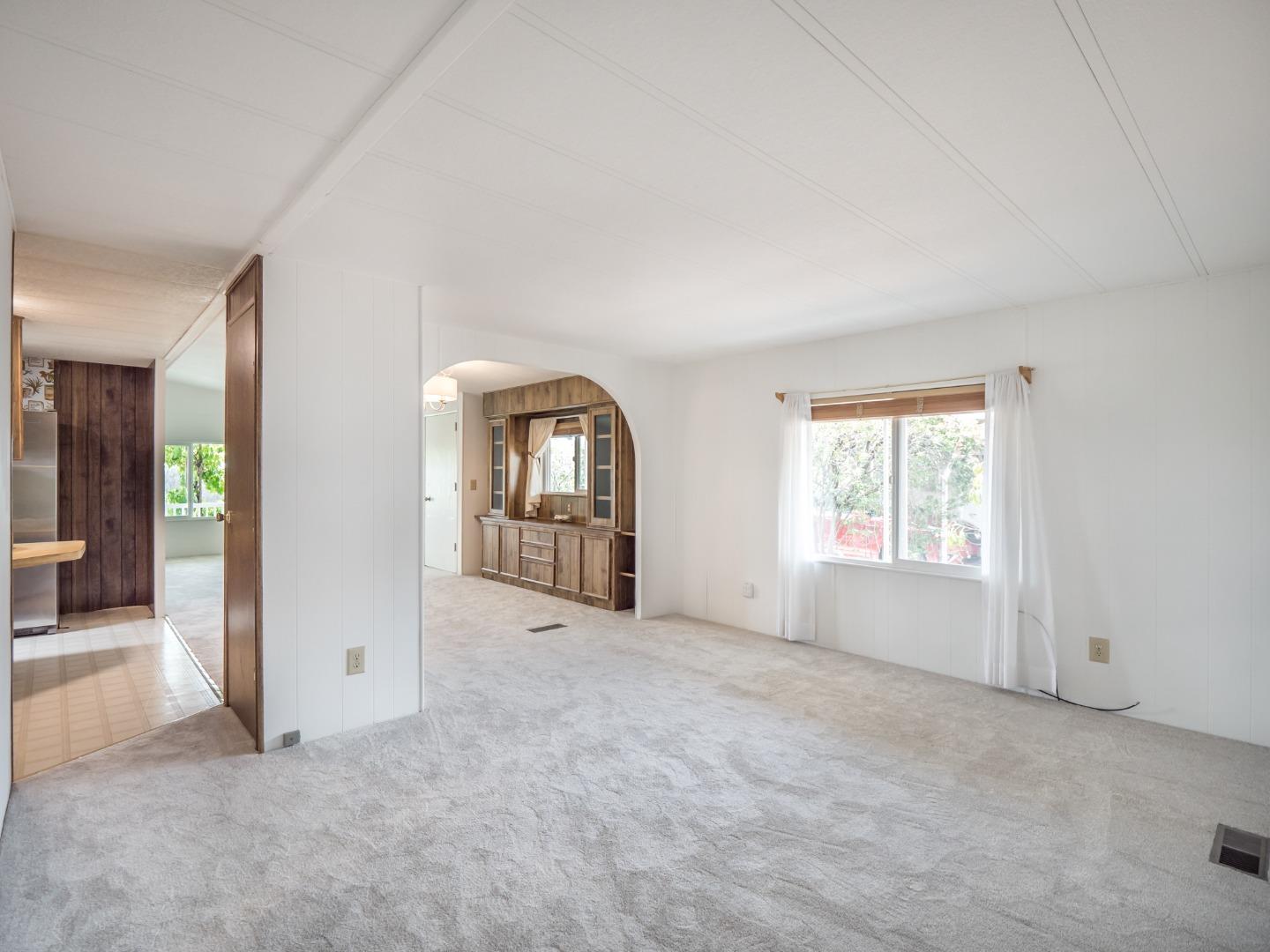 270 Hames Road, Unit 60 Corralitos, CA 95076 - Photo 5 of 32 an empty room with windows