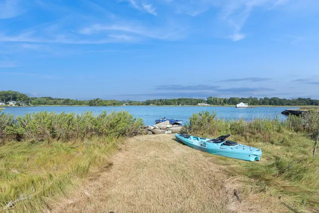 a view of lake with mountain in background