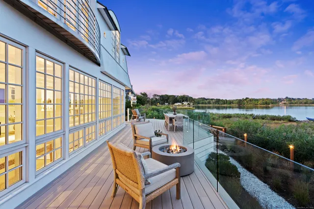 a view of swimming pool with outdoor seating