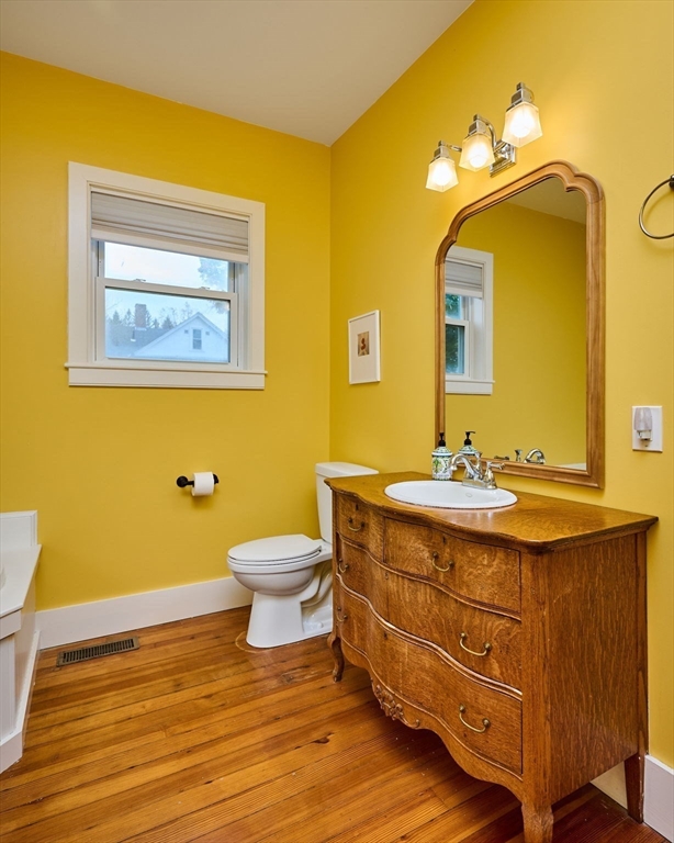 12 A Parker Avenue, Unit 1 Northfield, MA 01360 - Photo 12 of 28 a bathroom with a granite countertop sink and a mirror