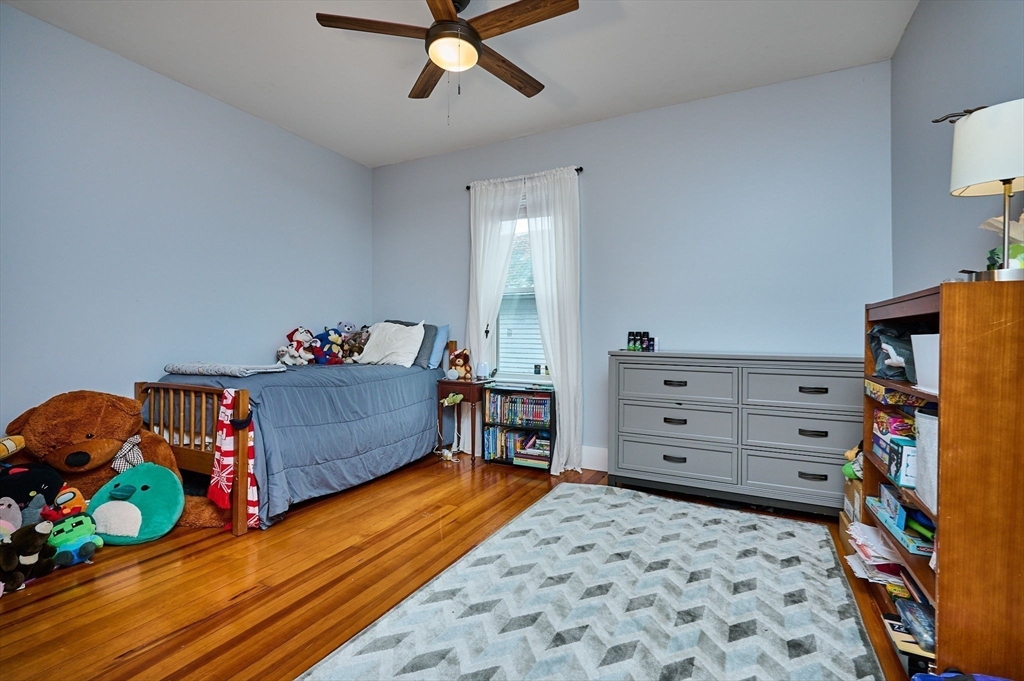 12 A Parker Avenue, Unit 1 Northfield, MA 01360 - Photo 14 of 28 a bed room with a bed and a baby crib
