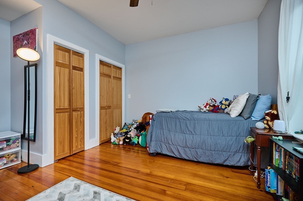 12 A Parker Avenue, Unit 1 Northfield, MA 01360 - Photo 15 of 28 a bedroom with furniture and a window