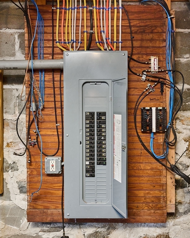 12 A Parker Avenue, Unit 1 Northfield, MA 01360 - Photo 19 of 28 a front view of a house with large windows