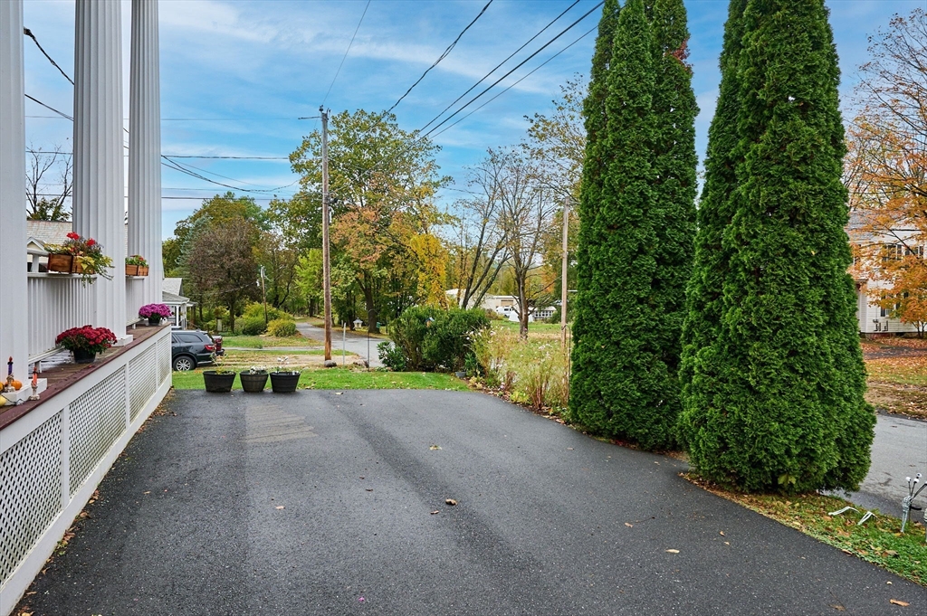 12 A Parker Avenue, Unit 1 Northfield, MA 01360 - Photo 24 of 28 a view of a bench in a back yard