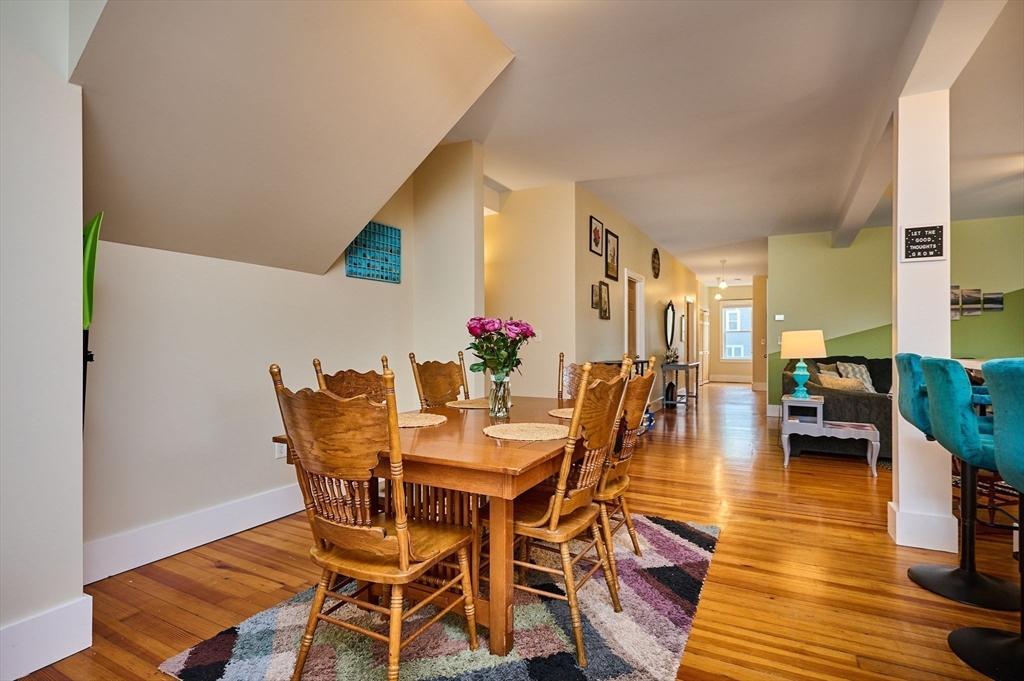 12 A Parker Avenue, Unit 1 Northfield, MA 01360 - Photo 3 of 28 a view of a dining room with furniture and wooden floor