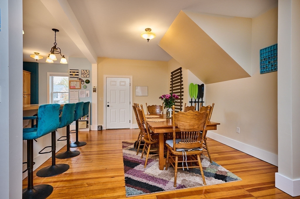 12 A Parker Avenue, Unit 1 Northfield, MA 01360 - Photo 4 of 28 a dining room with furniture and wooden floor