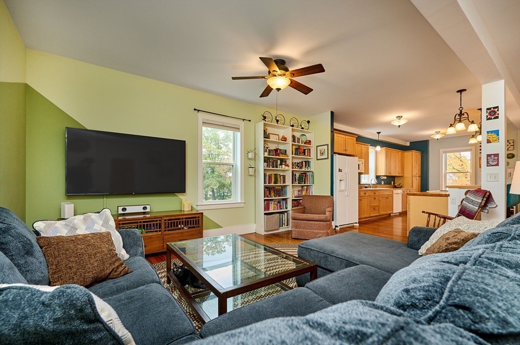 12 A Parker Avenue, Unit 1 Northfield, MA 01360 - Photo 9 of 28 a living room with furniture and a flat screen tv