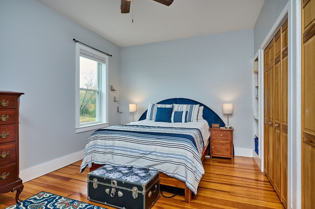 12 A Parker Avenue, Unit 1 Northfield, MA 01360 - Photo 10 of 28 a bedroom with a bed and a window