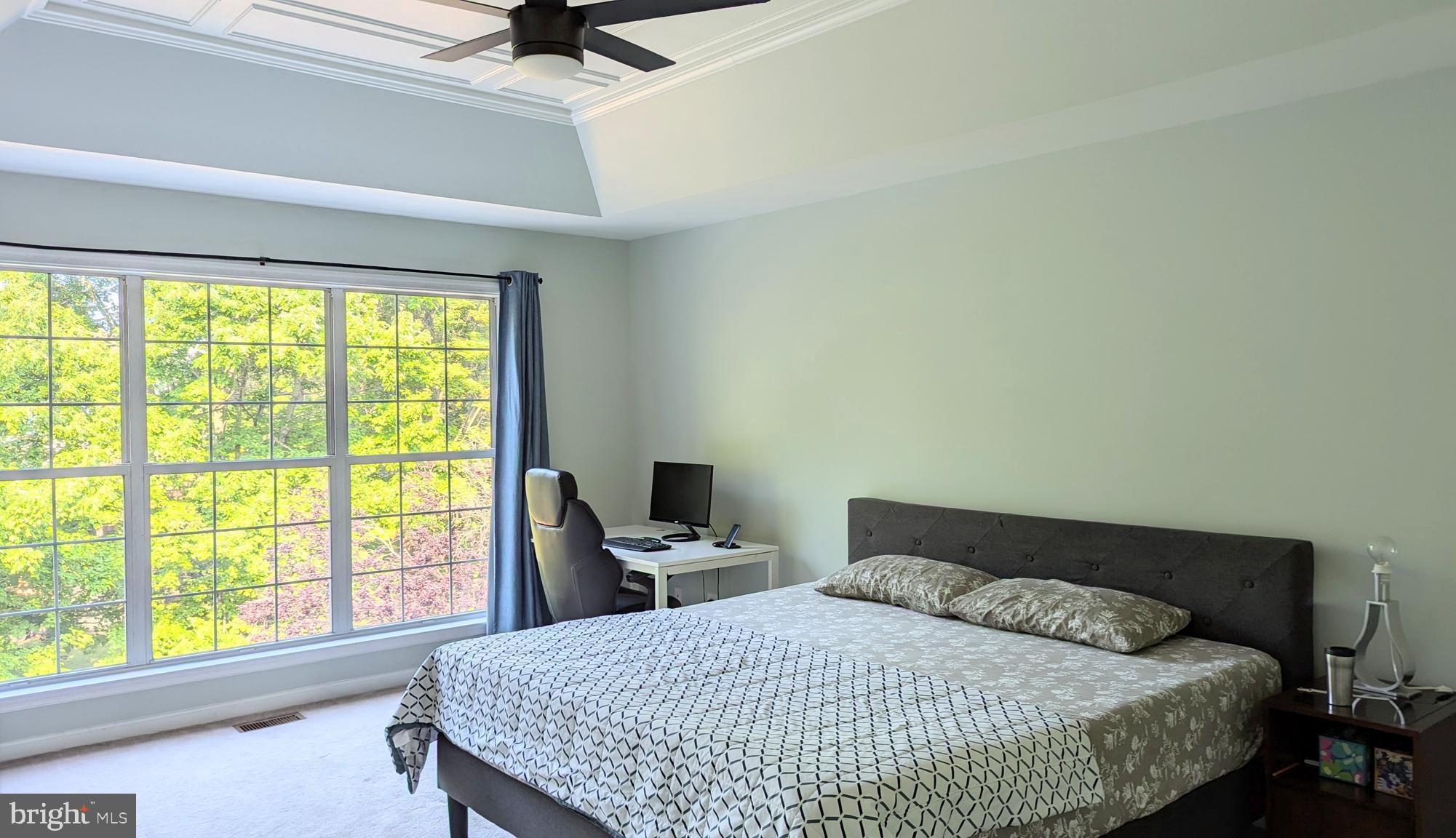 20867 Trinity Square Sterling, VA 20165 - Photo 11 of 19 a bedroom with a bed and a window
