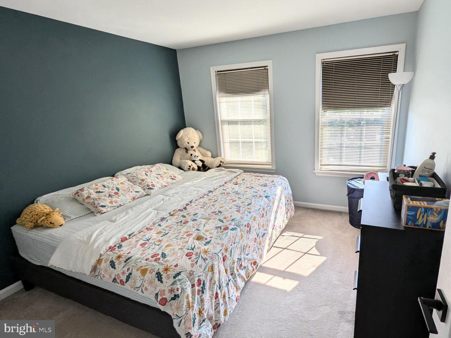 20867 Trinity Square Sterling, VA 20165 - Photo 12 of 19 a bedroom with a bed and wooden floor