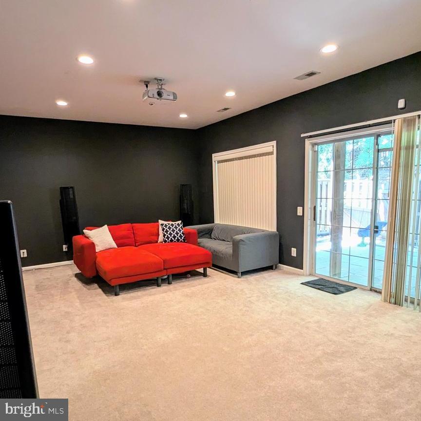 20867 Trinity Square Sterling, VA 20165 - Photo 17 of 19 a bed room with a bed and a large window