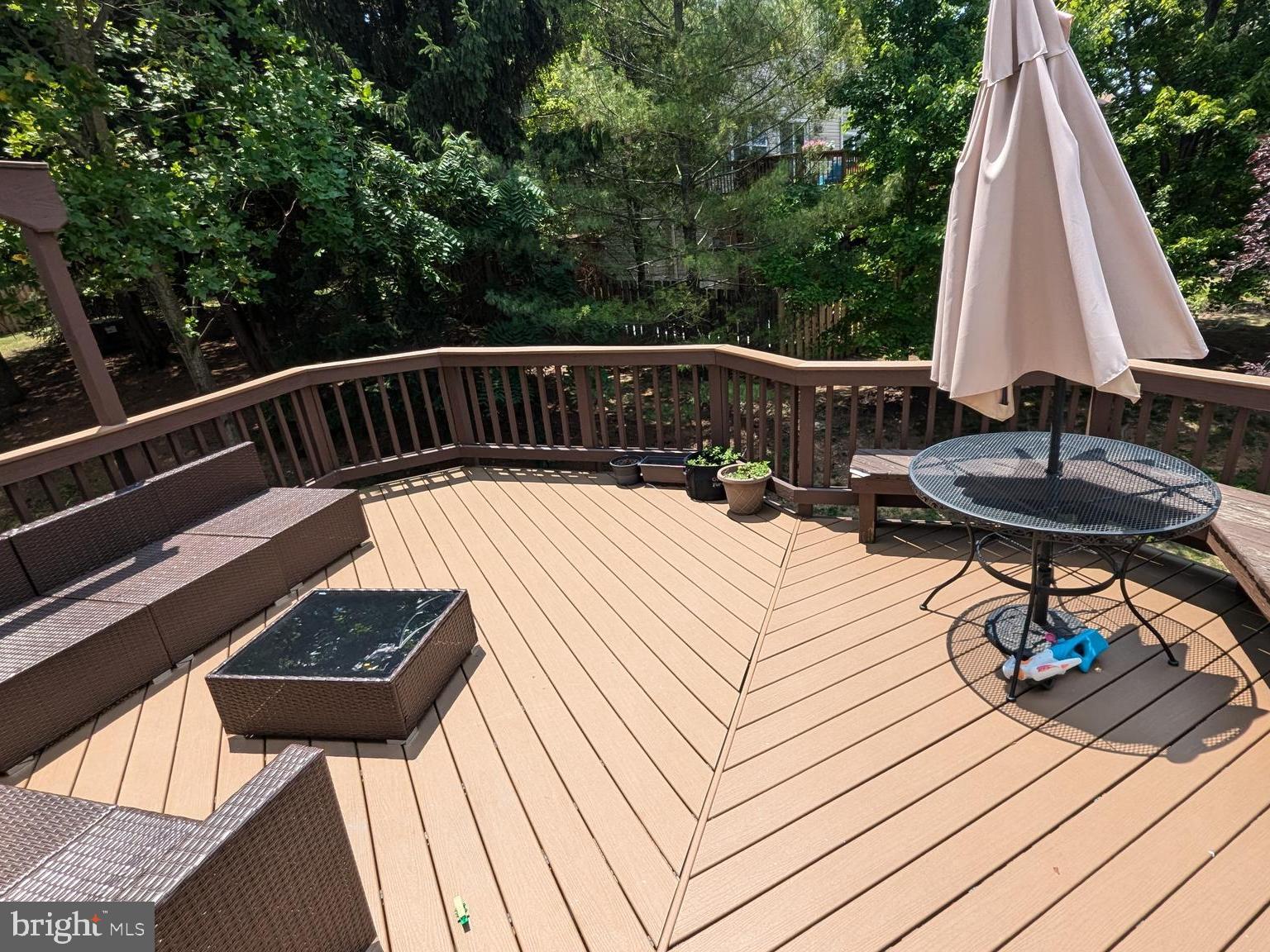 20867 Trinity Square Sterling, VA 20165 - Photo 19 of 19 a view of roof deck with a barbeque and furniture