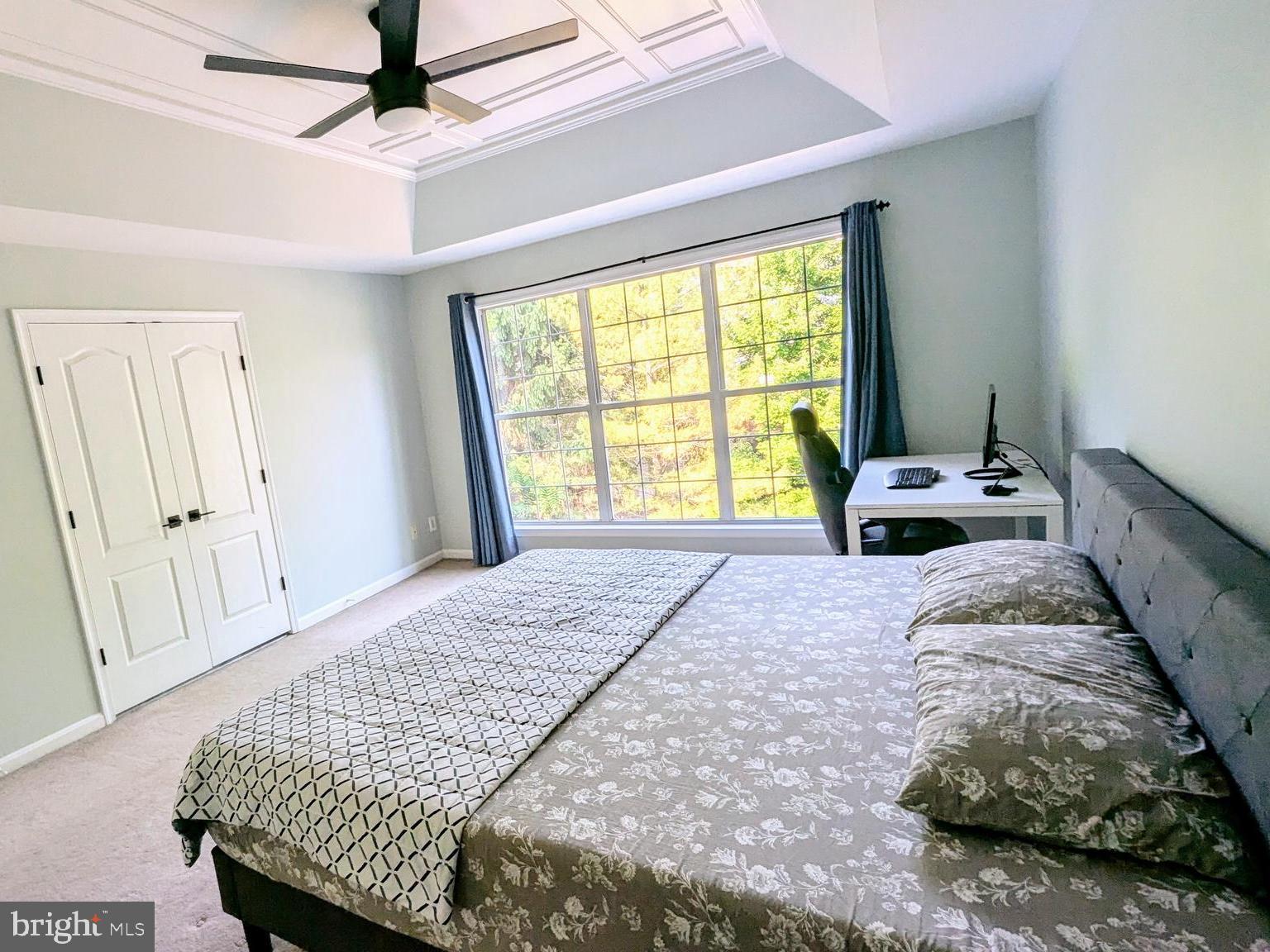 20867 Trinity Square Sterling, VA 20165 - Photo 10 of 19 a bedroom with a bed and a window