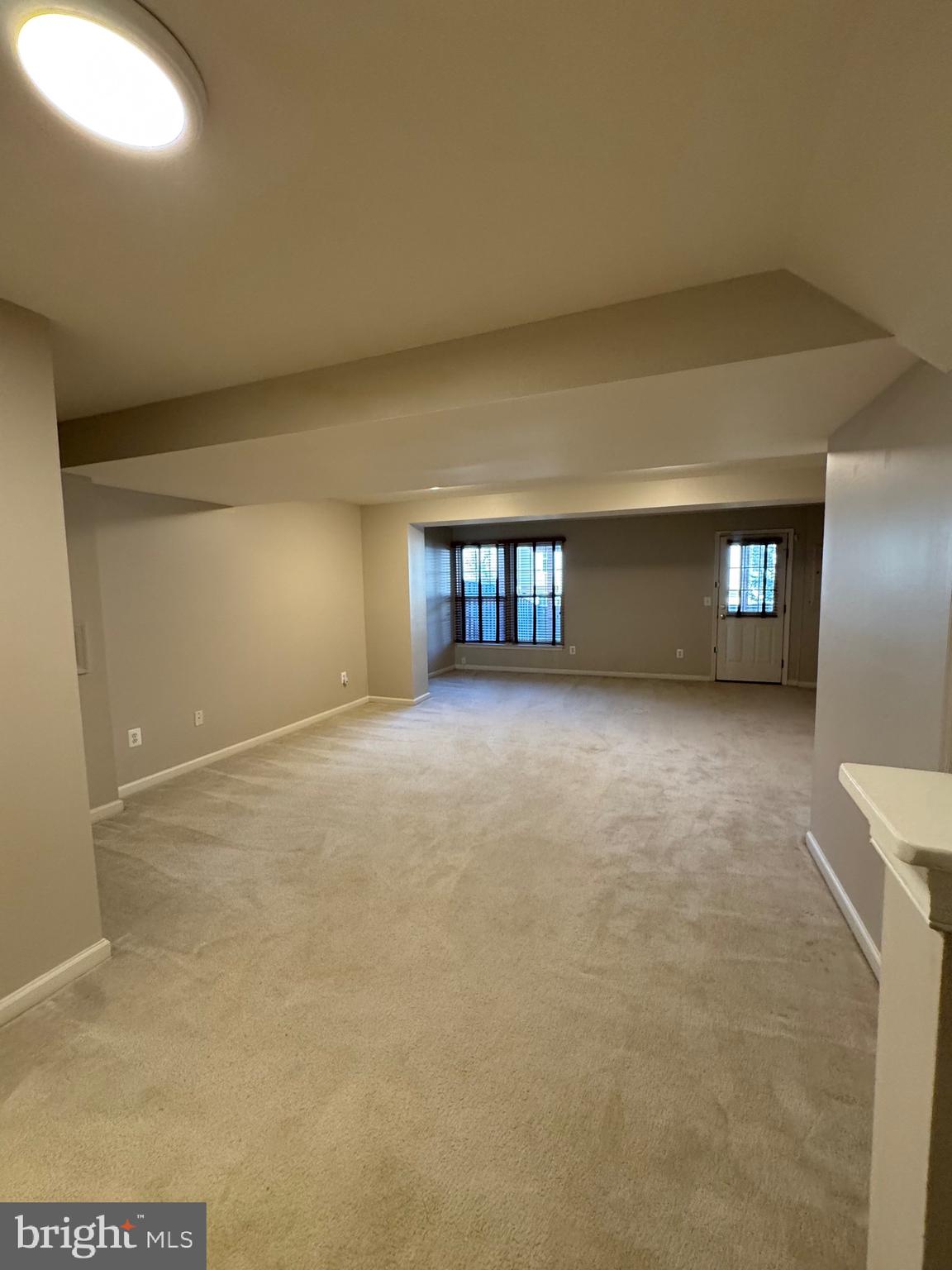 14342 Papilion Way Centreville, VA 20121 - Photo 12 of 46 a view of an empty room with window and stairs