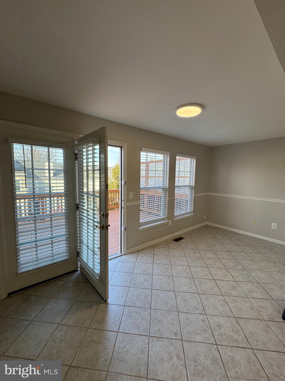 14342 Papilion Way Centreville, VA 20121 - Photo 15 of 46 a view of an empty room with a window
