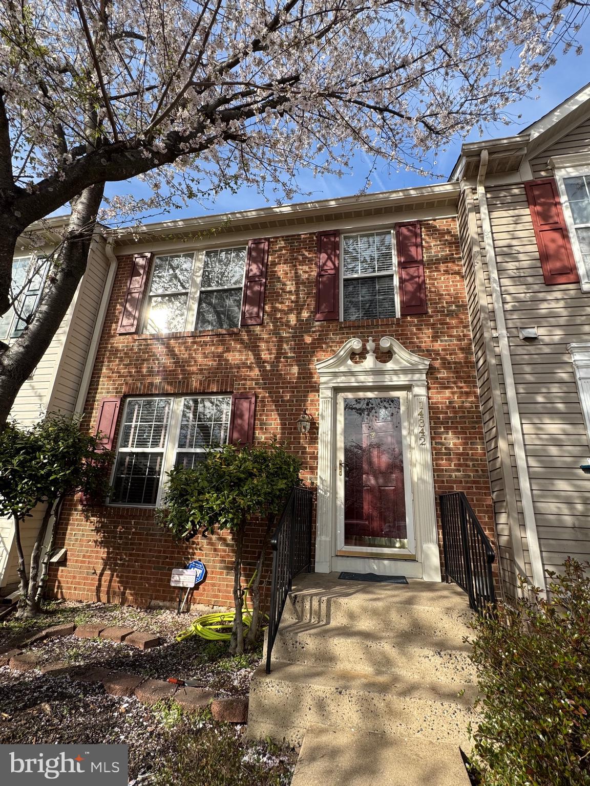 14342 Papilion Way Centreville, VA 20121 - Photo 2 of 46 a view of a building with door and outdoor space