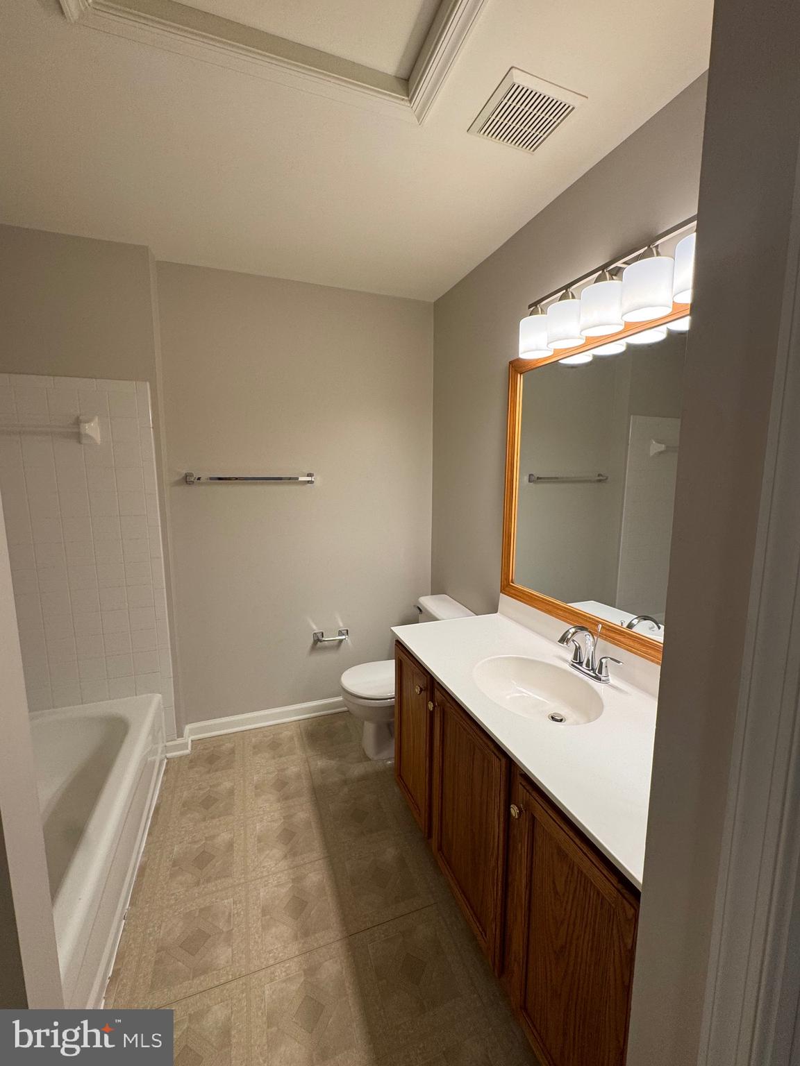 14342 Papilion Way Centreville, VA 20121 - Photo 37 of 46 a bathroom with a sink a toilet and shower