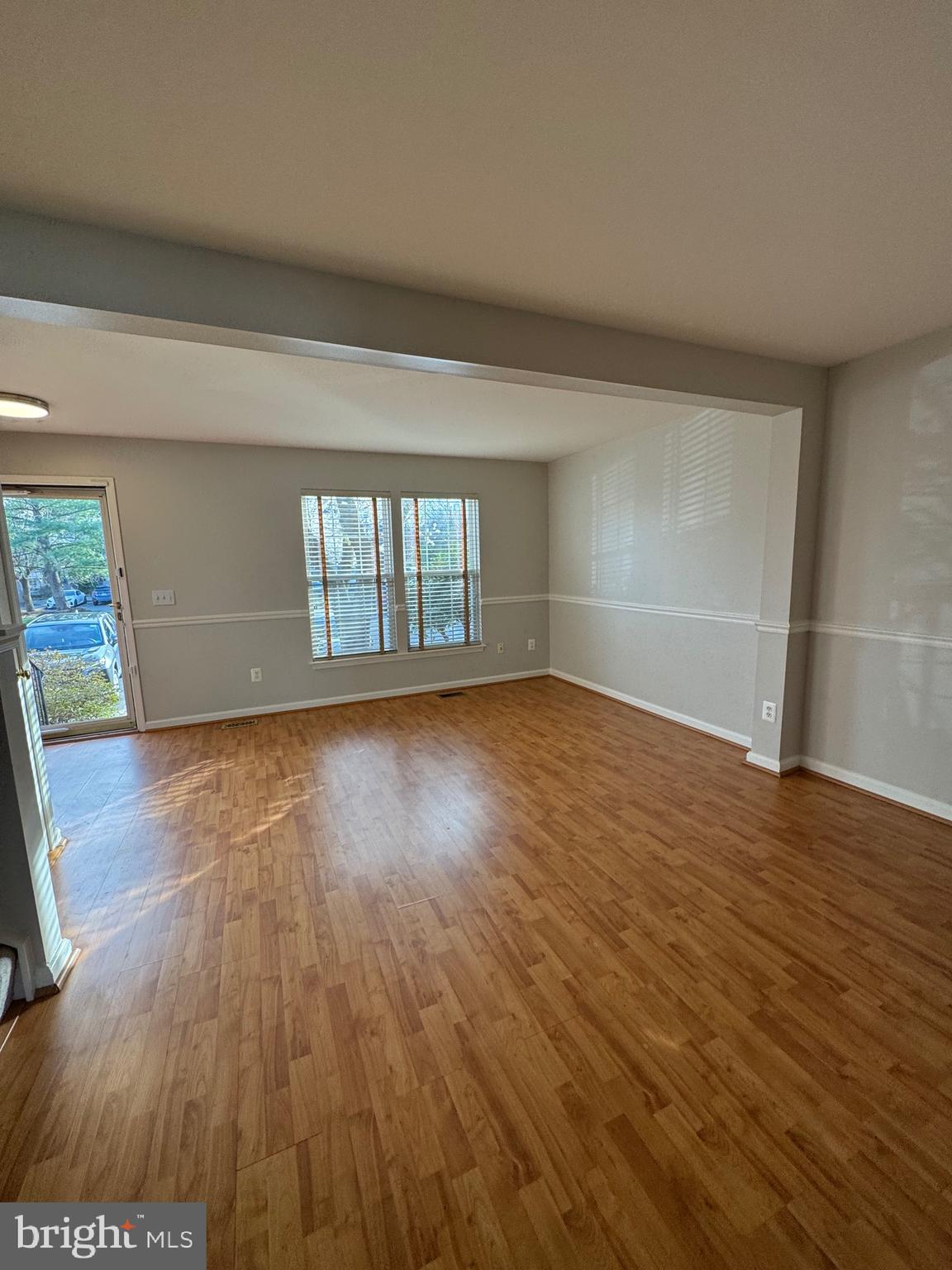 14342 Papilion Way Centreville, VA 20121 - Photo 38 of 46 wooden floor in an empty room with a window