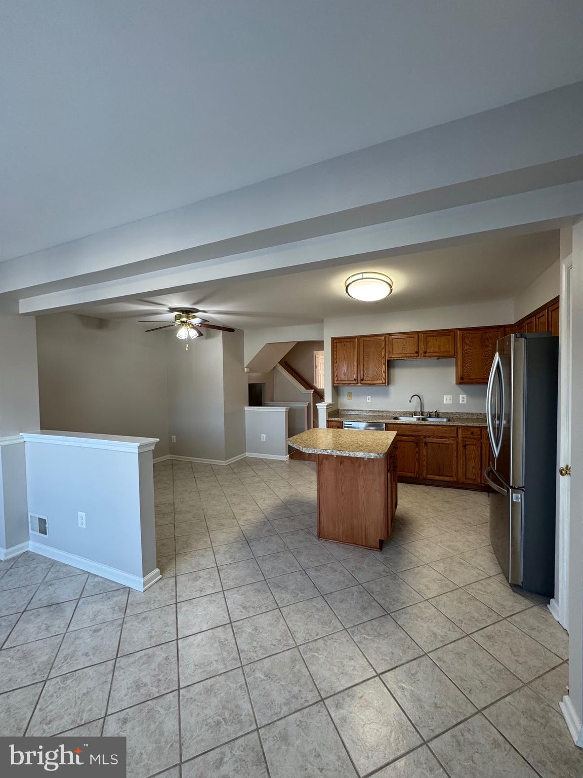 14342 Papilion Way Centreville, VA 20121 - Photo 43 of 46 a living room with a couch and a stove top oven