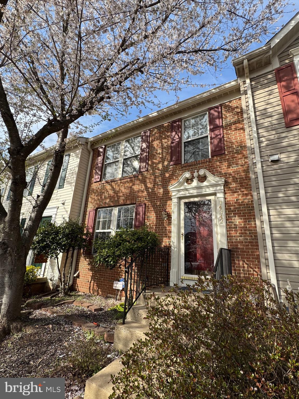 14342 Papilion Way Centreville, VA 20121 - Photo 45 of 46 a view of a backyard with a garden