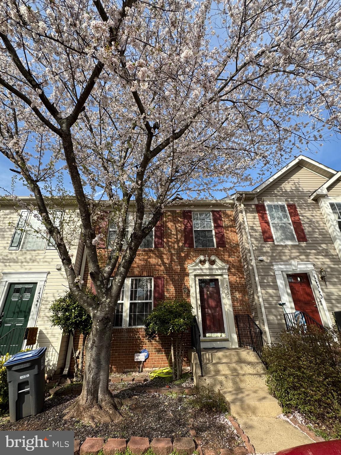 14342 Papilion Way Centreville, VA 20121 - Photo 46 of 46 a front view of a house with a yard