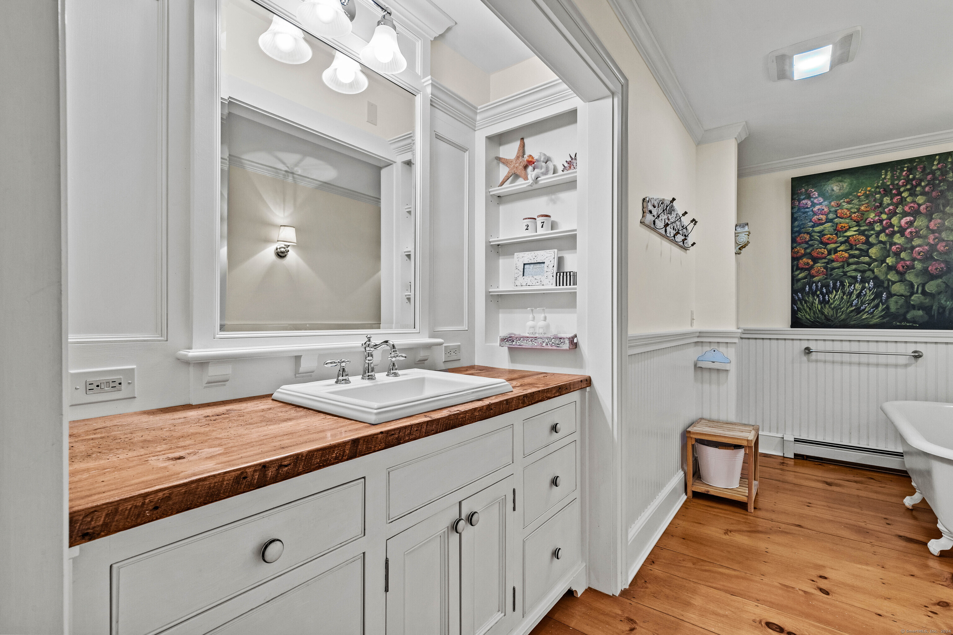 1 Hathaway Road East Lyme, CT 06333 - Photo 21 of 38 The remodeled bath has beautiful reclaimed wood counter, shower and a clawfoot tub