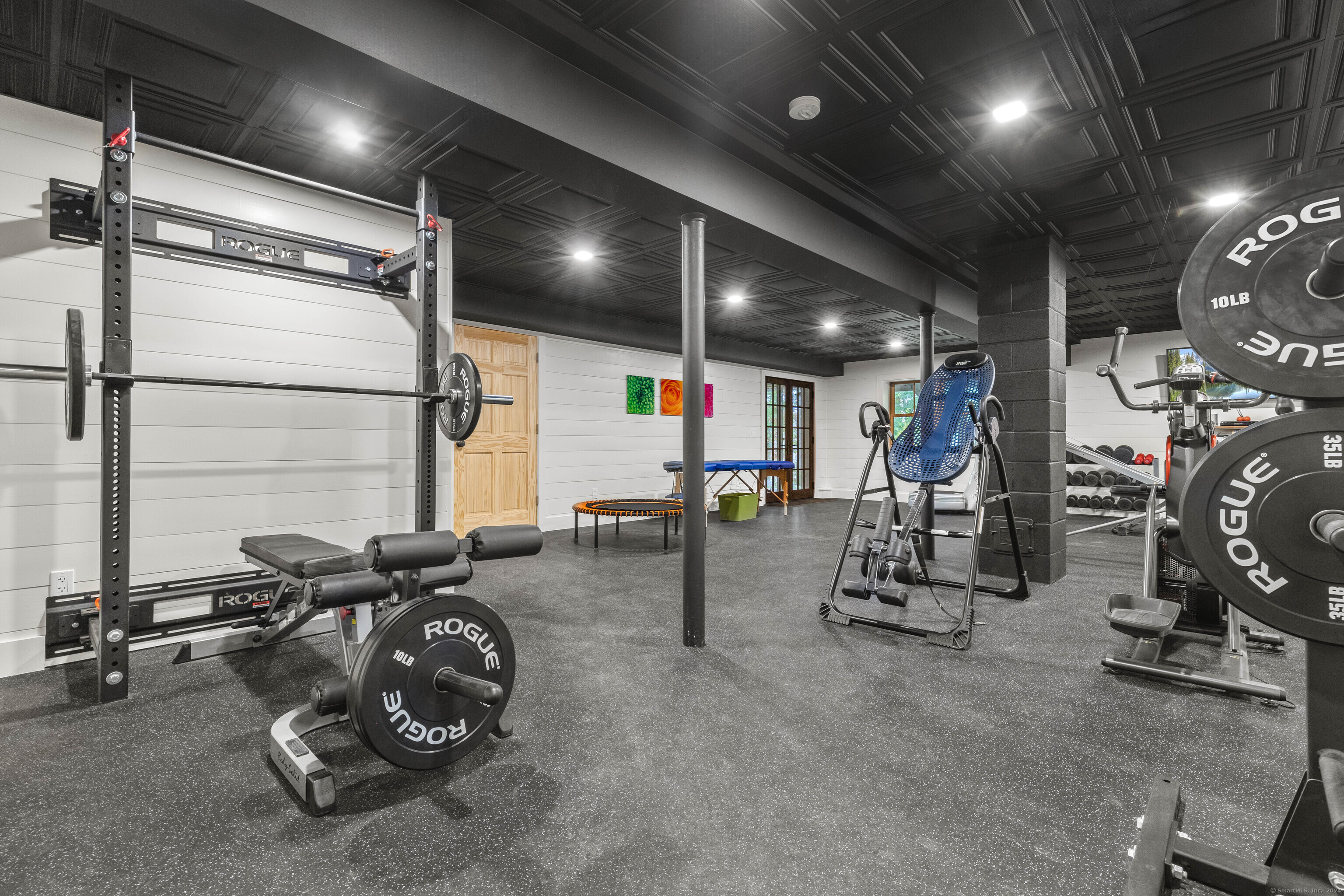 1 Hathaway Road East Lyme, CT 06333 - Photo 23 of 38 The lower level of the home features a gym space or family room