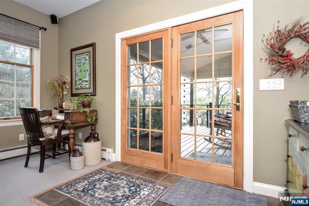 84 West Midland Avenue Paramus, NJ 07652 - Photo 19 of 37 a view of a dining room with furniture and a window
