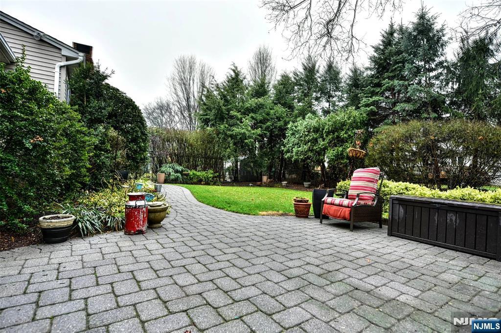 84 West Midland Avenue Paramus, NJ 07652 - Photo 30 of 37 a view of garden with patio