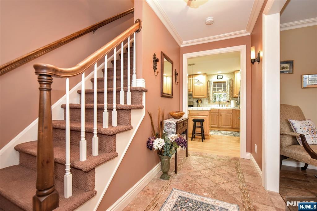 84 West Midland Avenue Paramus, NJ 07652 - Photo 3 of 37 a view of a living room and entry way