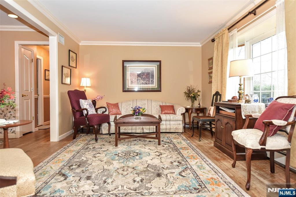84 West Midland Avenue Paramus, NJ 07652 - Photo 5 of 37 a living room with furniture and a window