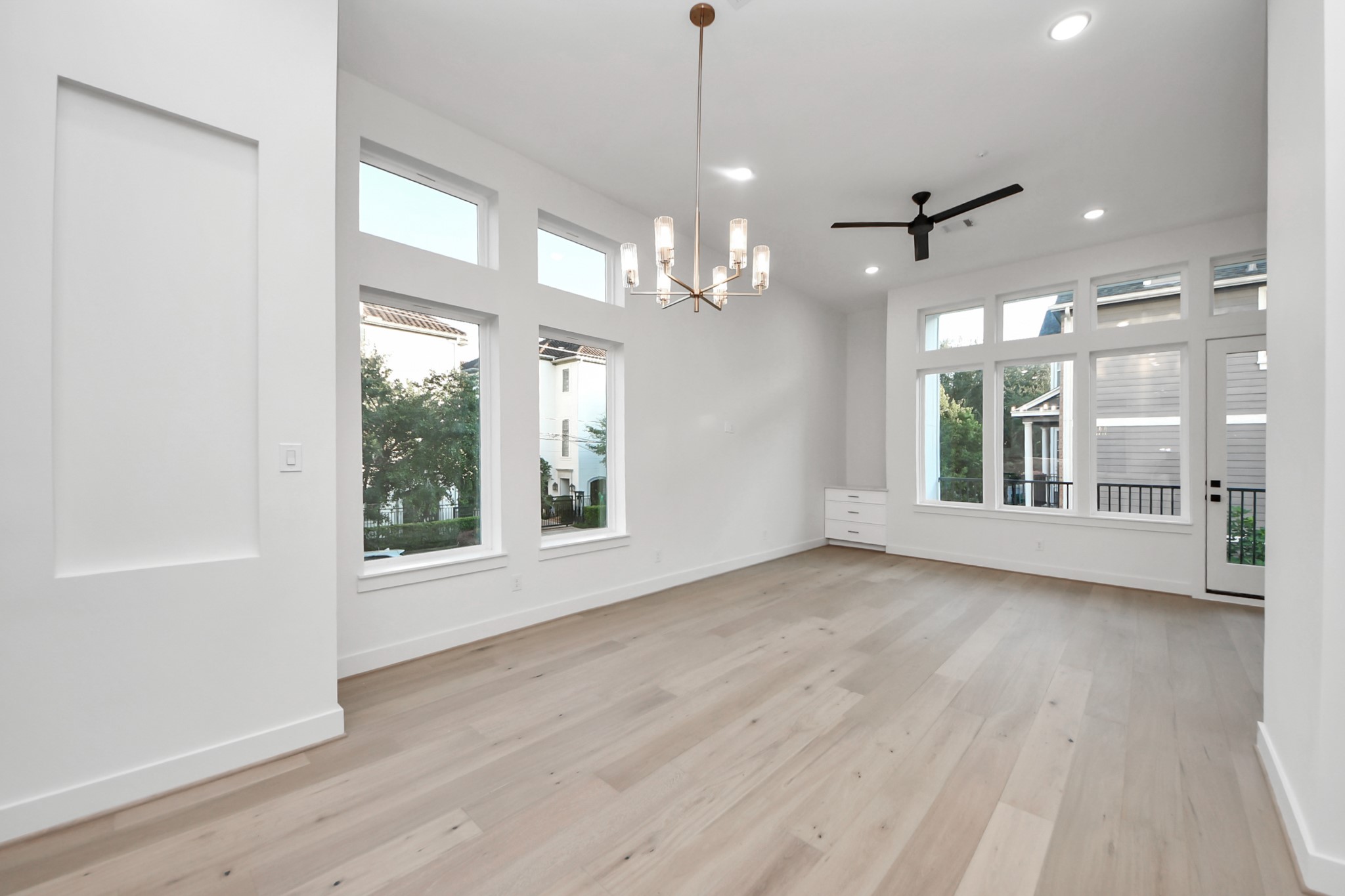 4819 Austin Street, Unit B Houston, TX 77004 - Photo 12 of 49 a view of an empty room with wooden floor and a window
