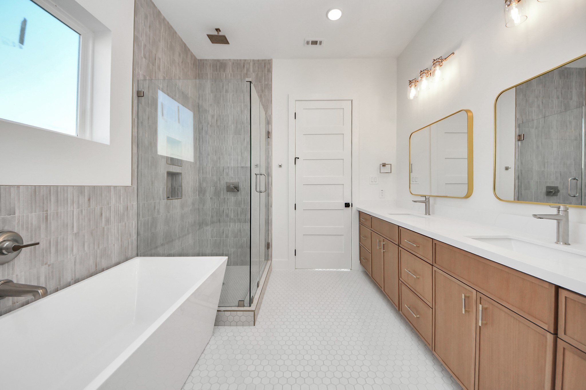 4819 Austin Street, Unit B Houston, TX 77004 - Photo 25 of 49 a bathroom with a tub a sink shower and mirror