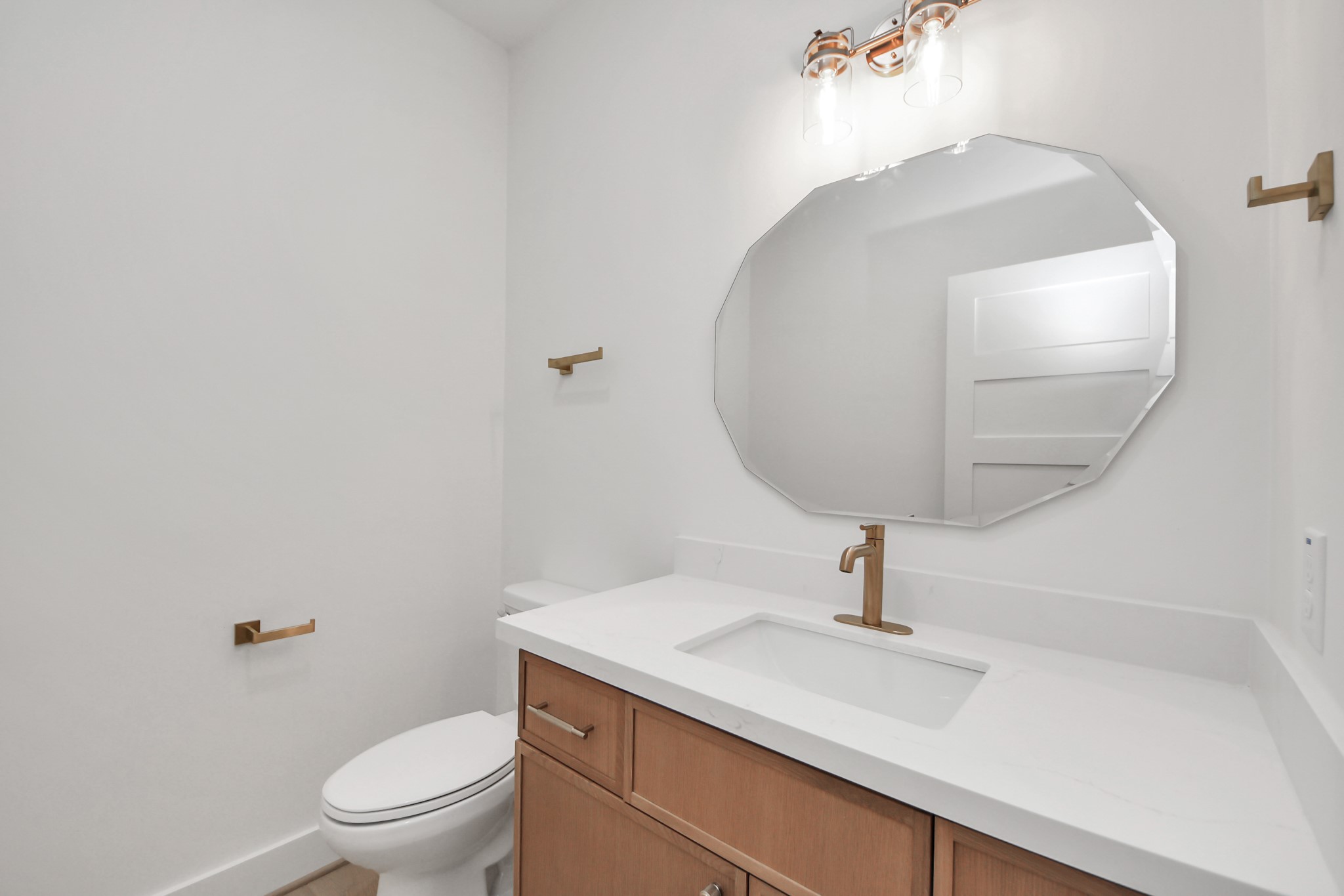 4819 Austin Street, Unit B Houston, TX 77004 - Photo 35 of 49 a bathroom with a sink a toilet and mirror