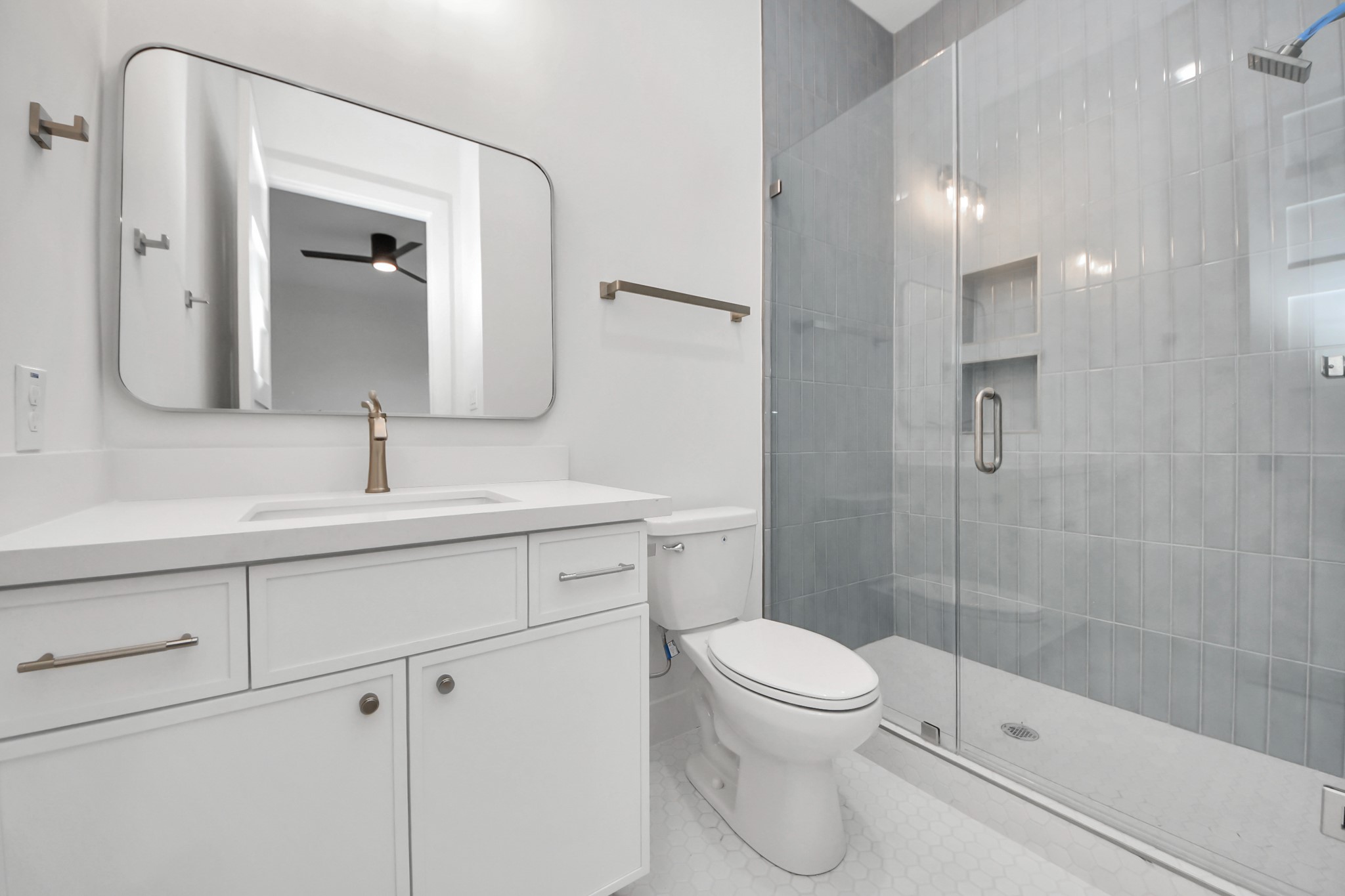 4819 Austin Street, Unit B Houston, TX 77004 - Photo 38 of 49 a bathroom with a sink a toilet and shower