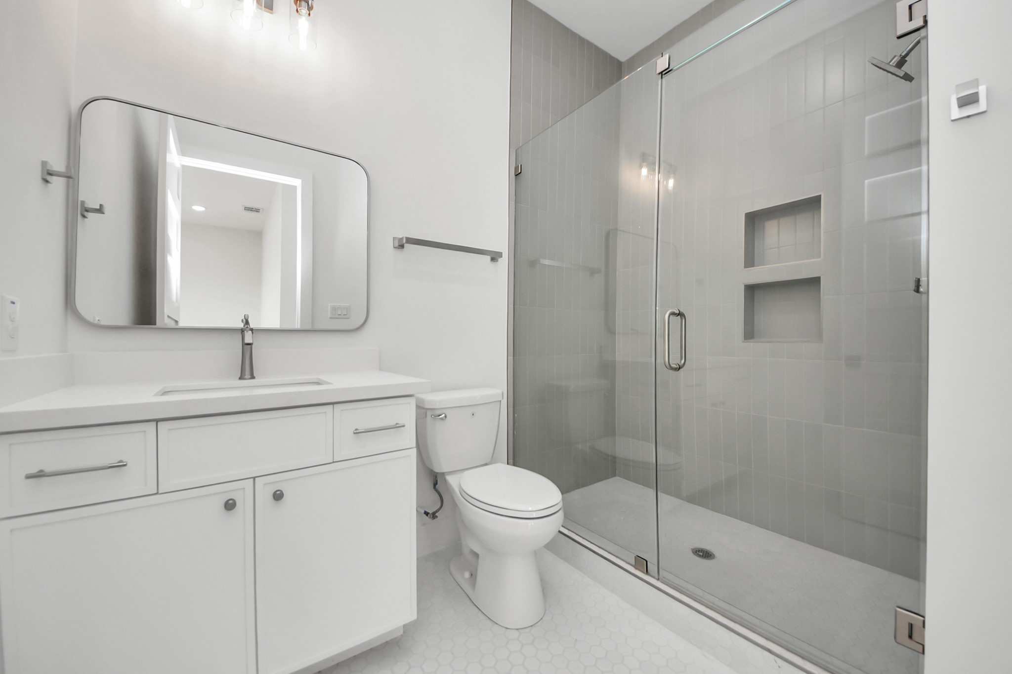 4819 Austin Street, Unit B Houston, TX 77004 - Photo 42 of 49 a bathroom with a toilet sink and shower
