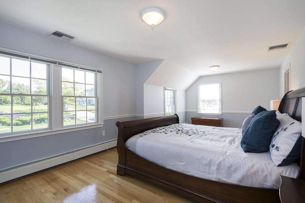 481 Jerusalem Road Cohasset, MA 02025 - Photo 18 of 30 a bedroom with a bed and a window