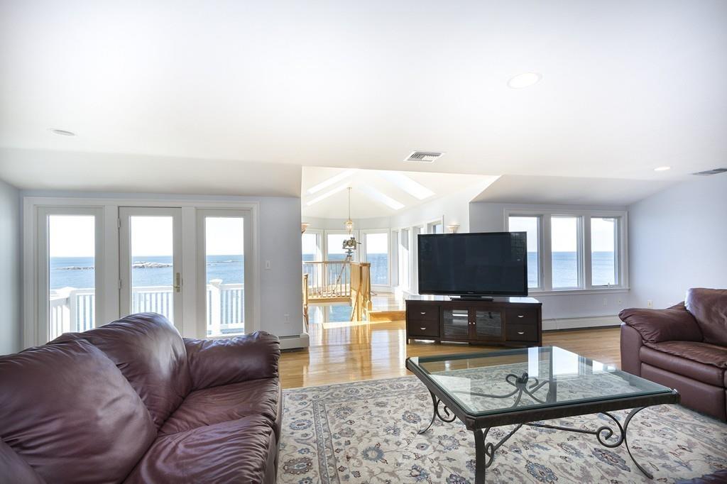 481 Jerusalem Road Cohasset, MA 02025 - Photo 21 of 30 a living room with furniture and a flat screen tv