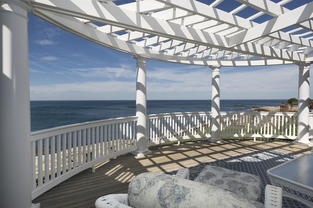 481 Jerusalem Road Cohasset, MA 02025 - Photo 4 of 30 a view of a porch with a wooden fence