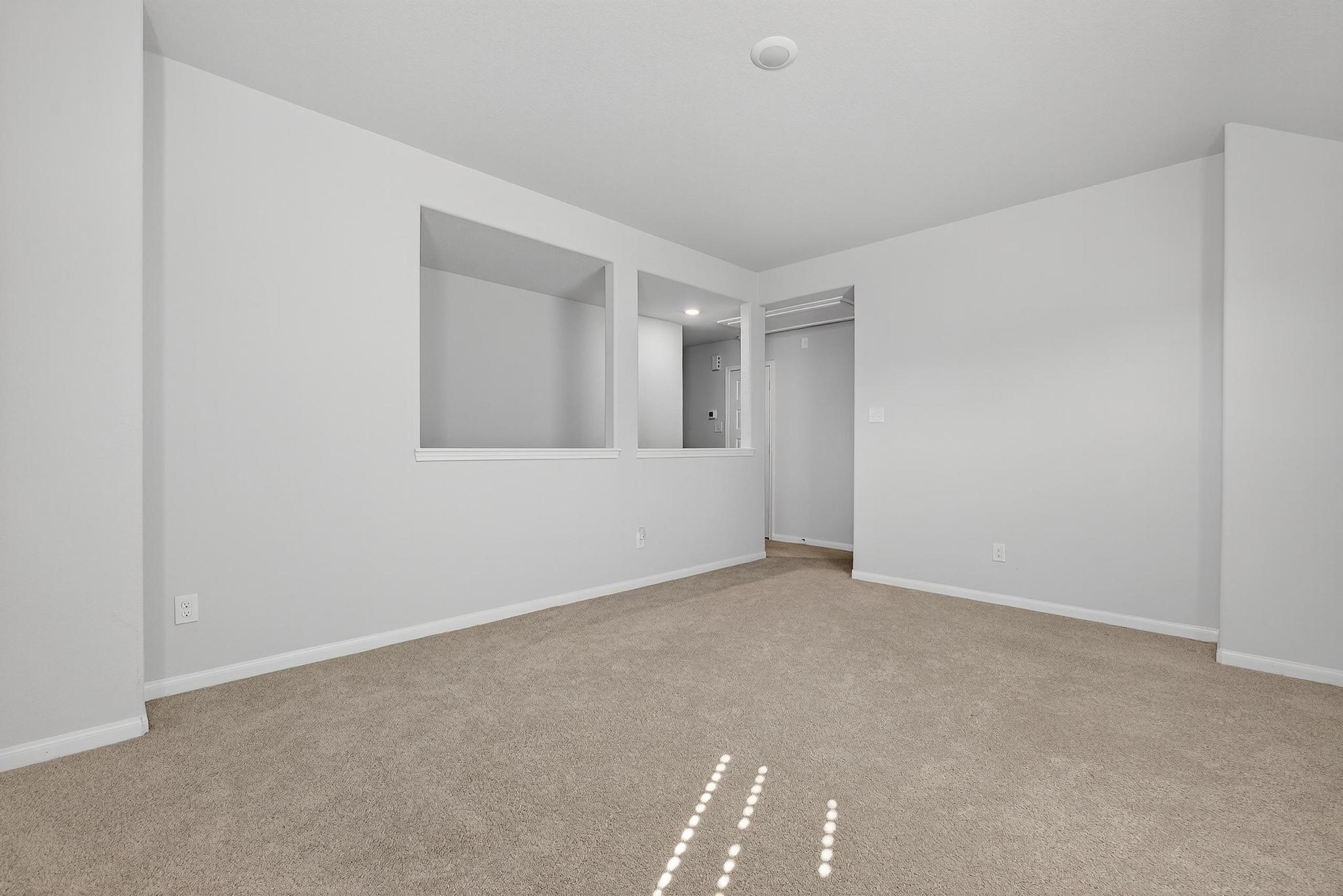 1409 Mount Bassie Trail Conroe, TX 77301 - Photo 12 of 26 a view of an empty room with a window